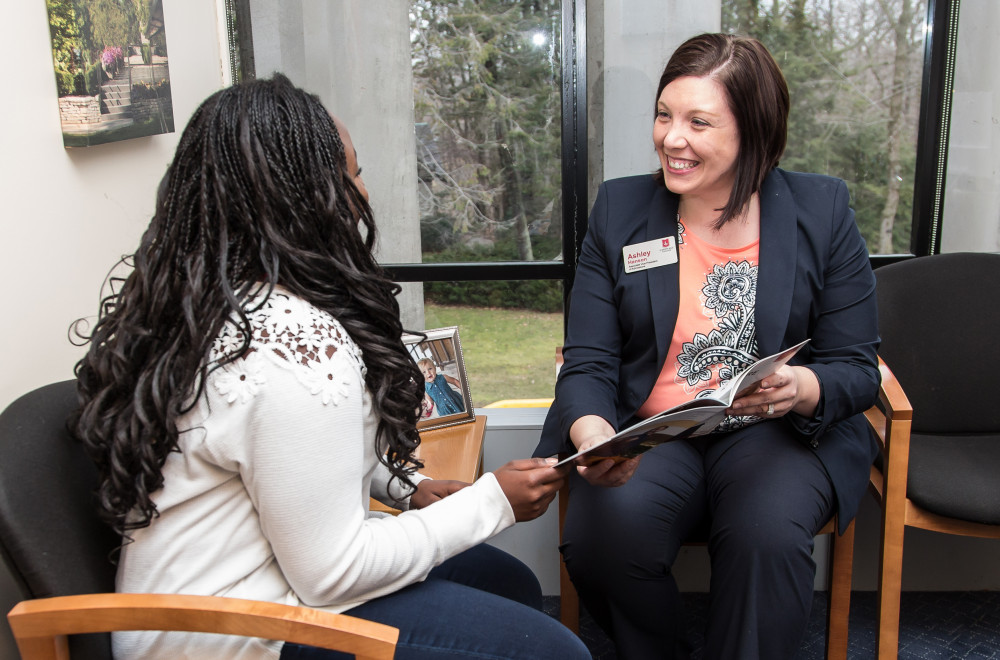 Admissions counselor Ashley Hanson meets with a student.