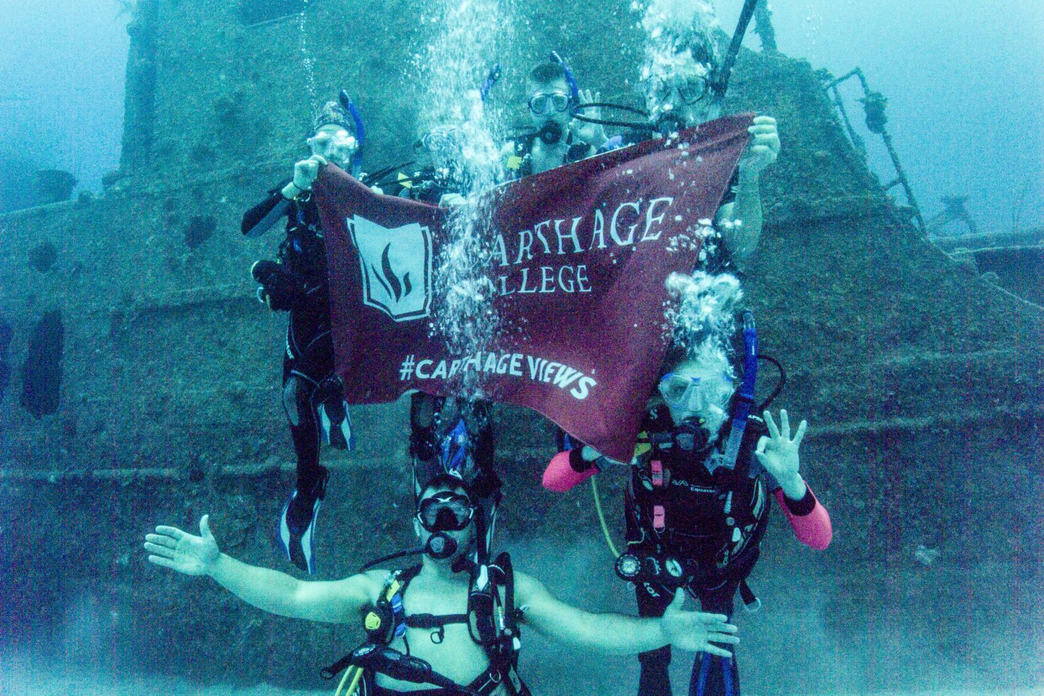Underwater exploration: Students scuba dive in Honduras for the J-Term study tour Biodiversity, B...
