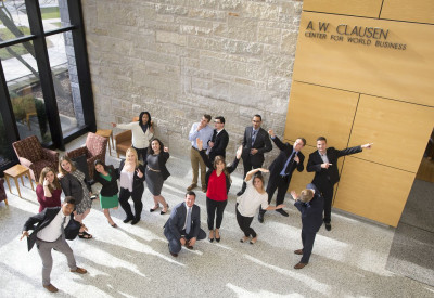 Members of Velocity Consulting pose for a photo in the A. W. Clausen Center for World Business.