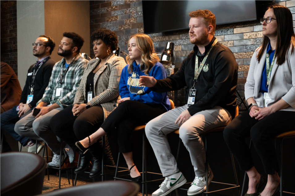 Panelists at Fiserv Forum speak to students from the Sport Sales course.