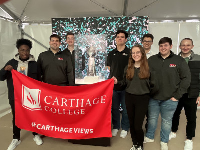 Carthage sport business students and faculty.