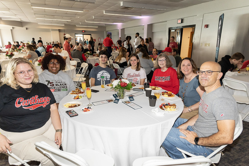 Families and alumni enjoying brunch during Homecoming 2023.