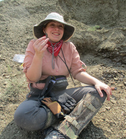 Chloe Harper ?23 holding a T. rex tooth she found during the field course in July 2021. Photo by ...