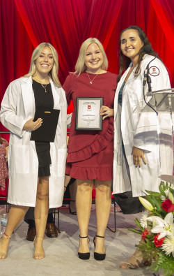 Clinical Instructor Danielle Kozak Joy receiving the Excellence and Innovation in Clinical Teachi...