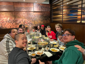 Students enjoying a hot pot meal at the Happy Lab restaurant.