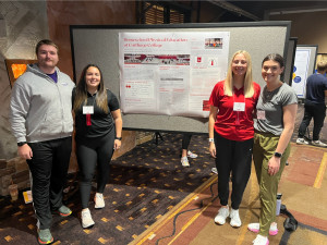Amber Moser ?23 and Sarah Pena ?23 present at Wisconsin Health and Physical Education Conference.
