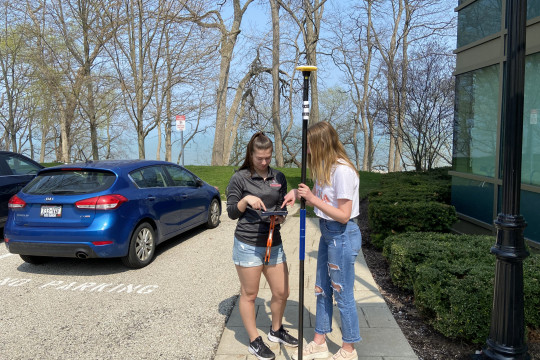 Becca Joas ?22 and Sara Fitzgibbon ?24 working with the new Trimble Catalyst DA2 GPS to collect h...