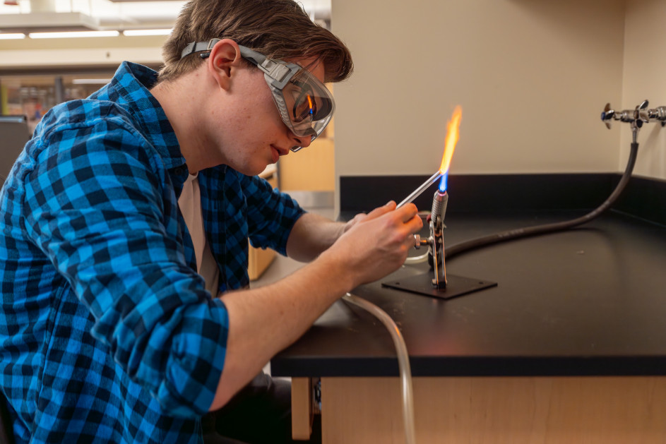 Students in Professor John Kirk's class learn about chemistry through glass blowing.