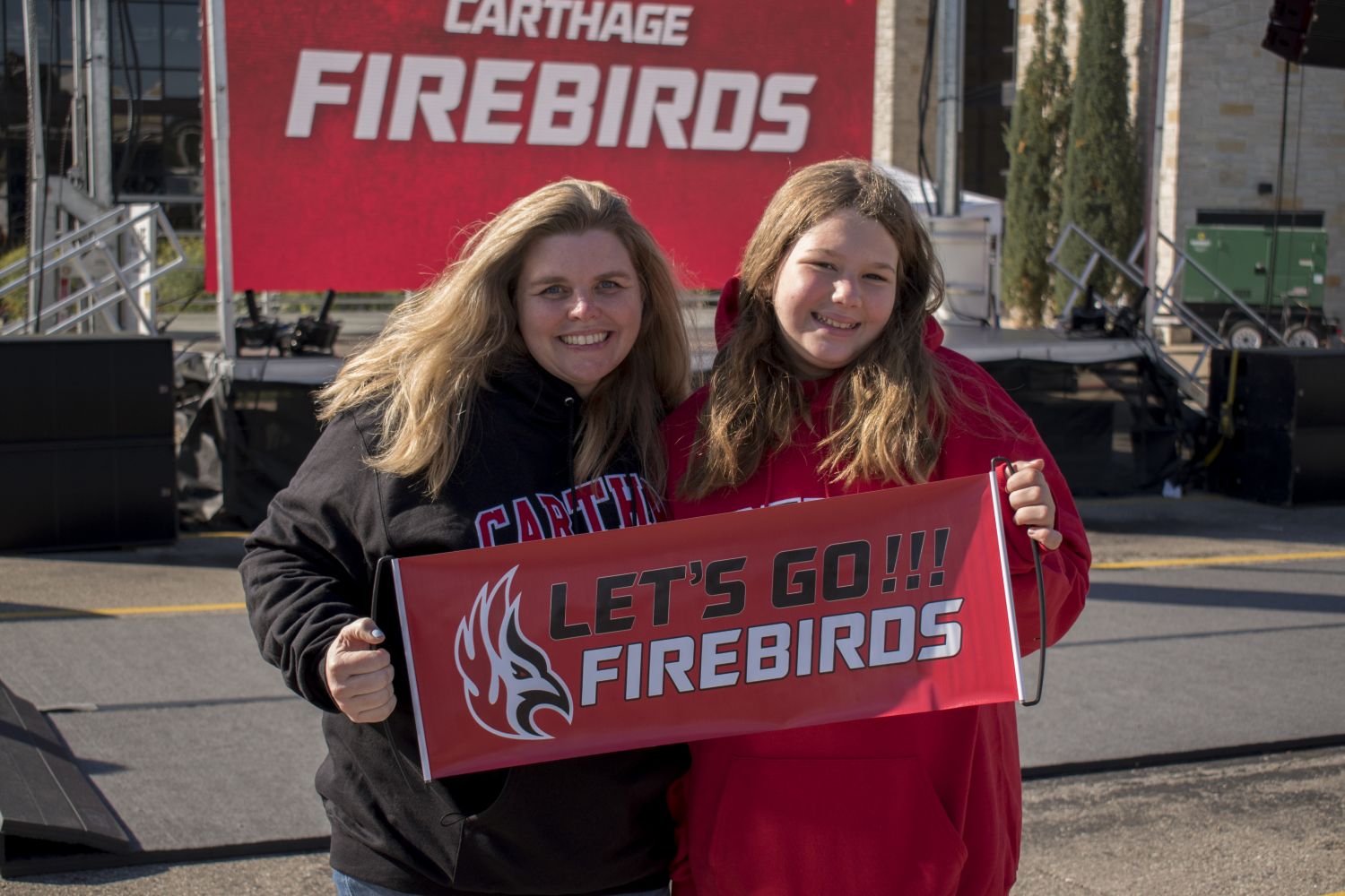 A couple of Firebirds fans show their spirit at Homecoming.