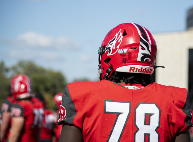 A Carthage football player stands on Art Keller Field during the Homecoming football game, Oct. 1...