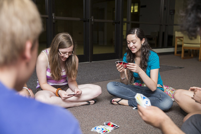 Students play cards at Chapel Night Live during Carthage Orientation and Kick-Off Days.