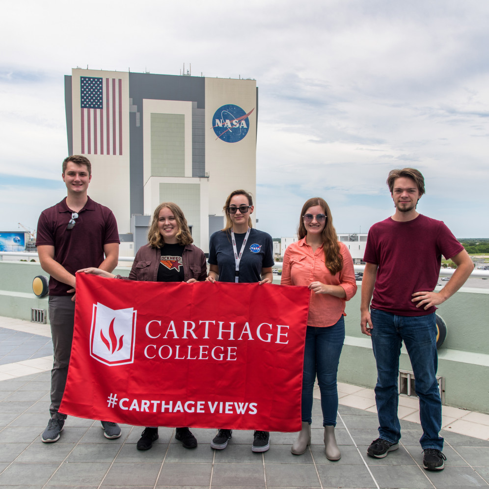 Students and Prof. Kevin Crosby outside of NASA.