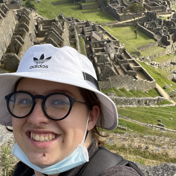 Lorin Bucur in front of Machu Picchu, picture for student voices profile.