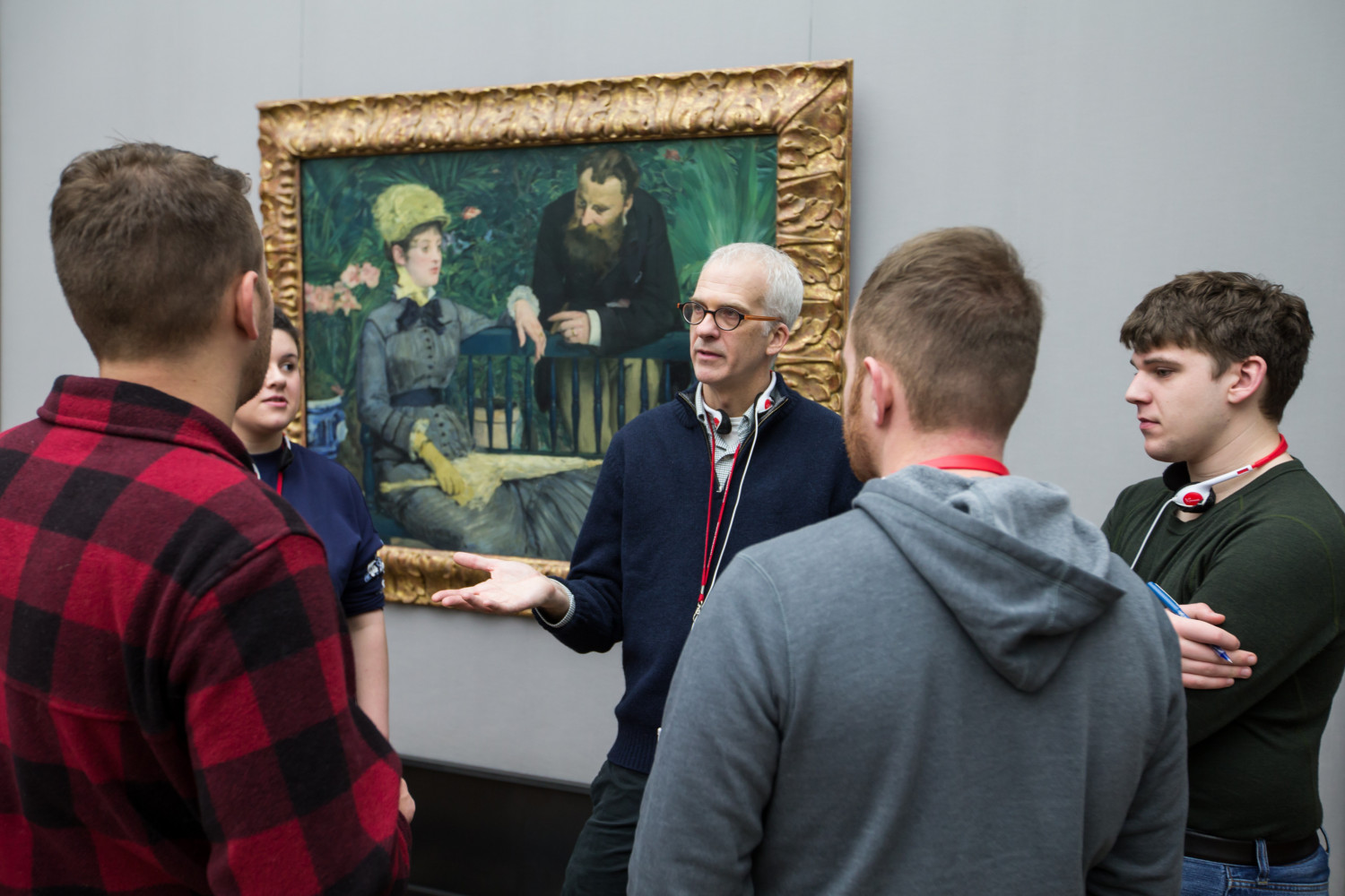 Prof. Temple Burling and students view art in a museum in Germany.