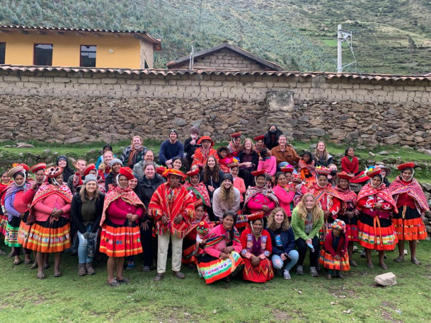 Students with villagers from the town of Willoq, Peru