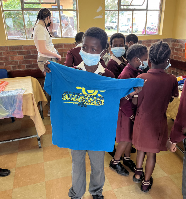 The Future of Africa sent Nkume Primary School students T-shirts.