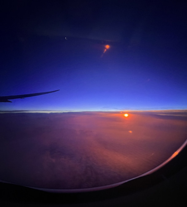 Sunrise in a plane back to the United States.