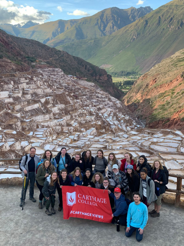 Students in front of the natural salt mines in Marasal