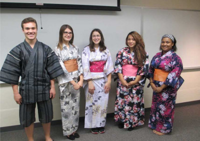 Students learning how to wear Japanese Yukata (for females) and jinbee (for males).