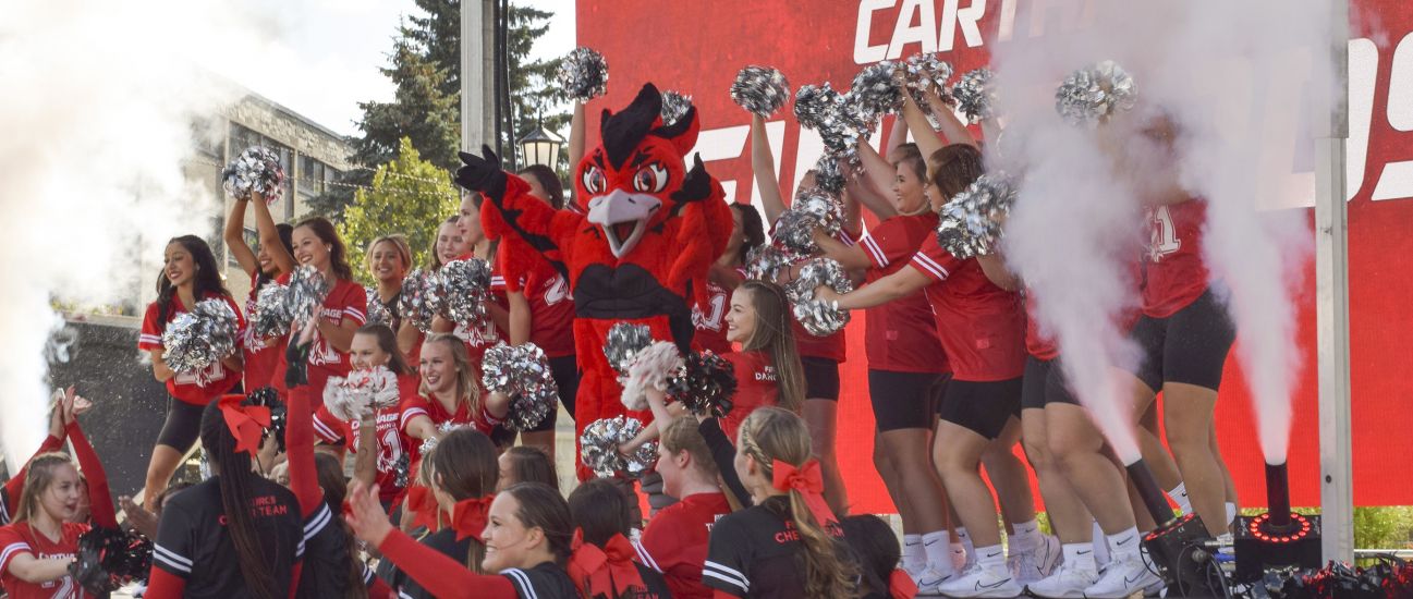 The Carthage College spirit team reveals Ember, the new Firebirds mascot, during Homecoming Weeke...