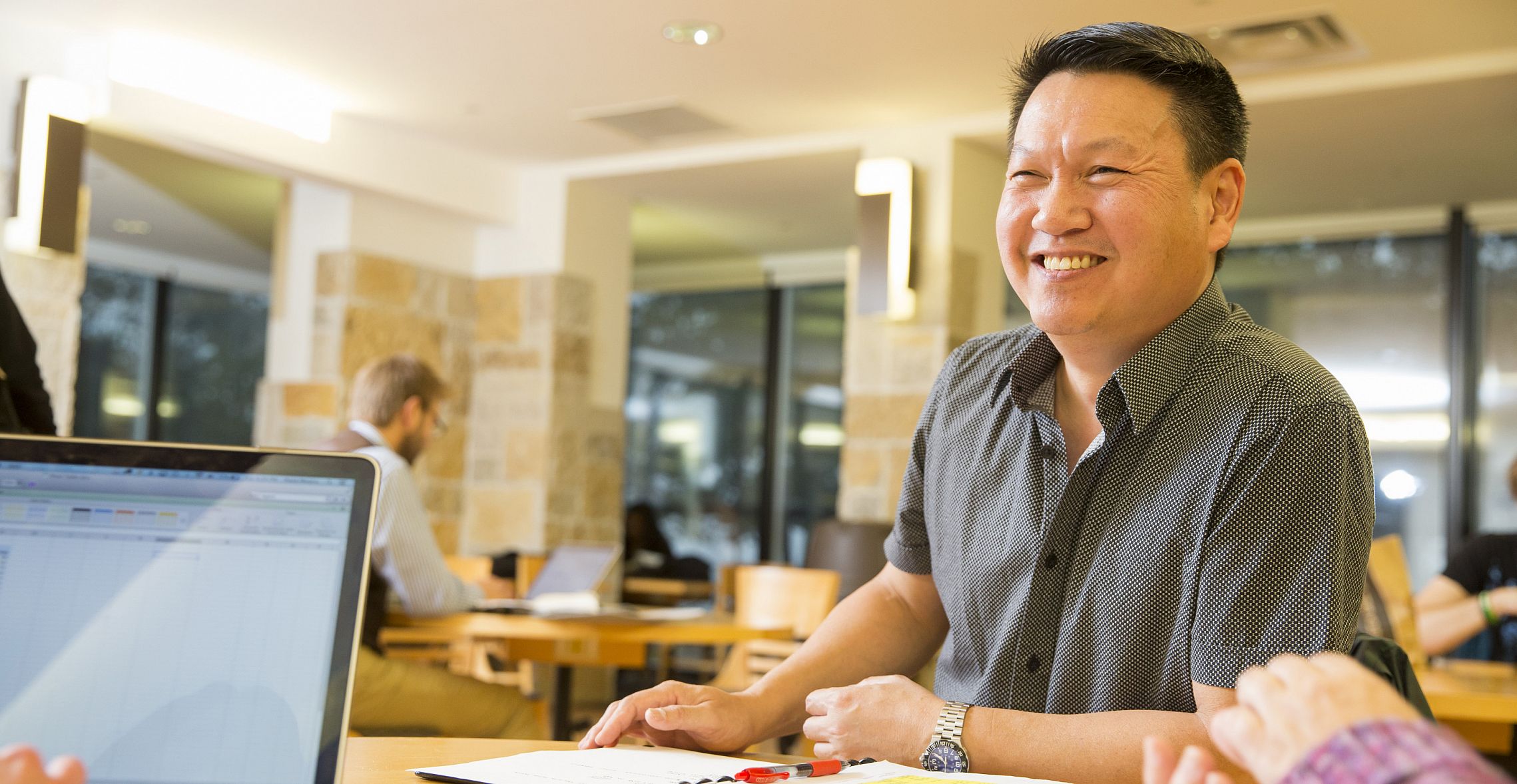 A Master of Education student studies with other students pursuing their master's in education in Hedberg Library. Carthage offers o...