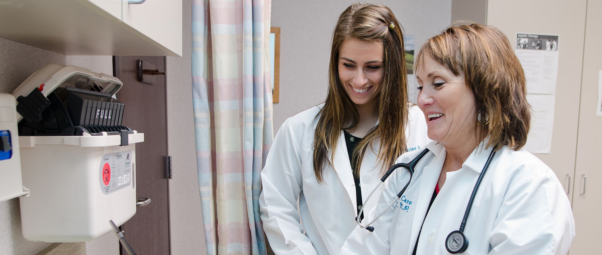 Alyse Mikolas '14 shadows her mother, Sandra, a nurse practitioner, at Aurora Health Center in Kenosha. A new program designed by Sandra ...