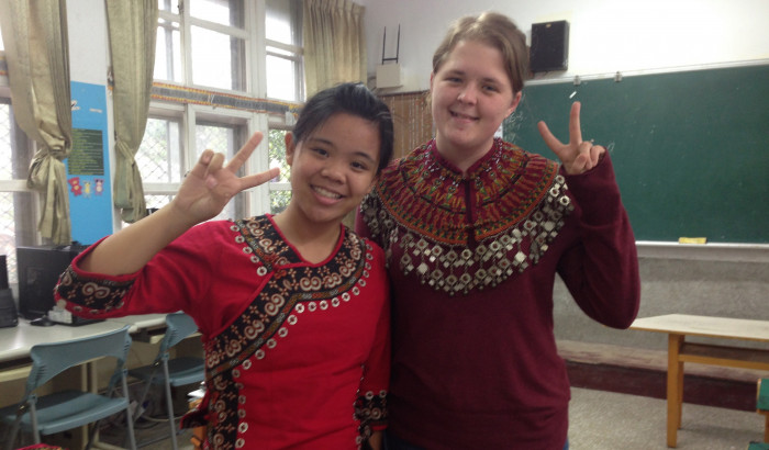 Jessie Bingaman ?16 dons a traditional Paiwan collar, with her sixth-grade student Annie, in trad...