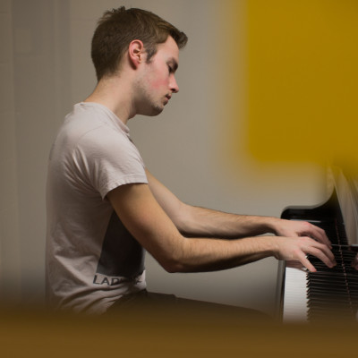 A piano student rehearsing.