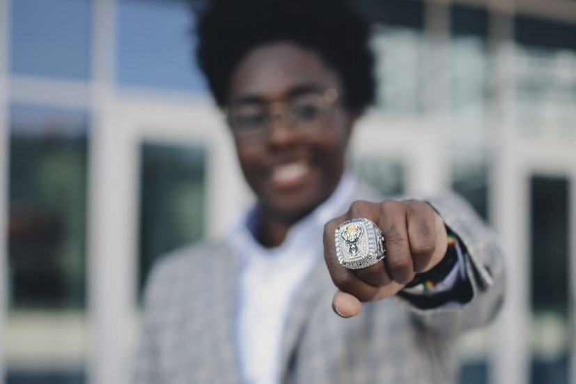 Ayanna Crenshaw ?23 shows off a ring she got as a sales intern with the Milwaukee Bucks.