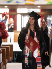 A student after receiving her Carthage diploma.