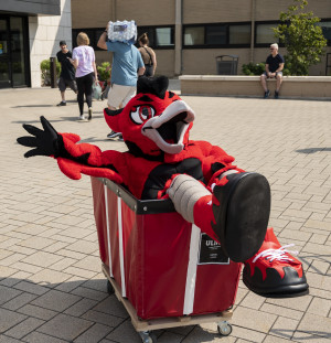 Ember, the Carthage Firebirds mascot, took a rest during move-in day as New Student Orientation b...