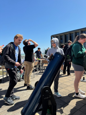 The Physics Department sets up a telescope for students during the solar eclipse on April 8.